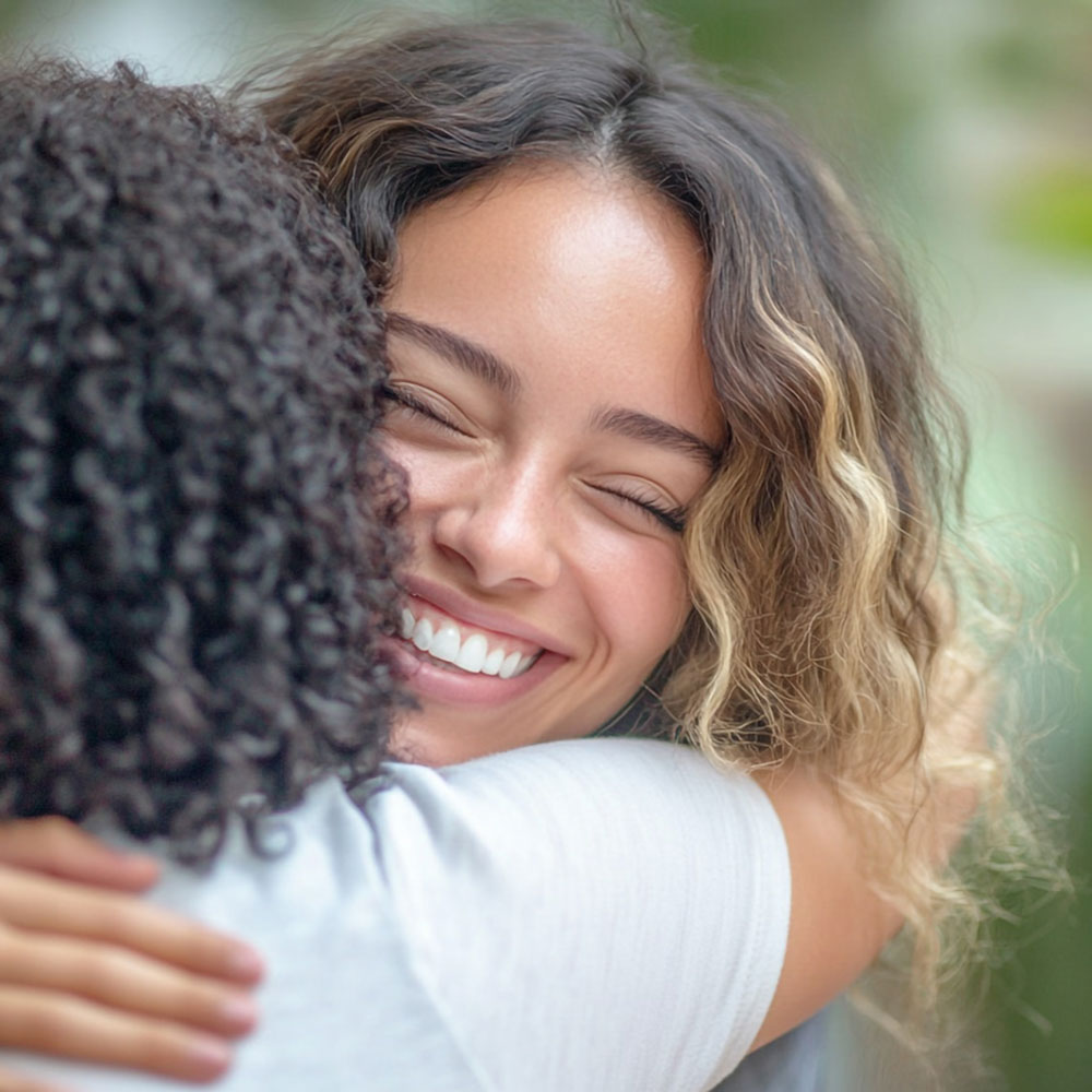two women hugging