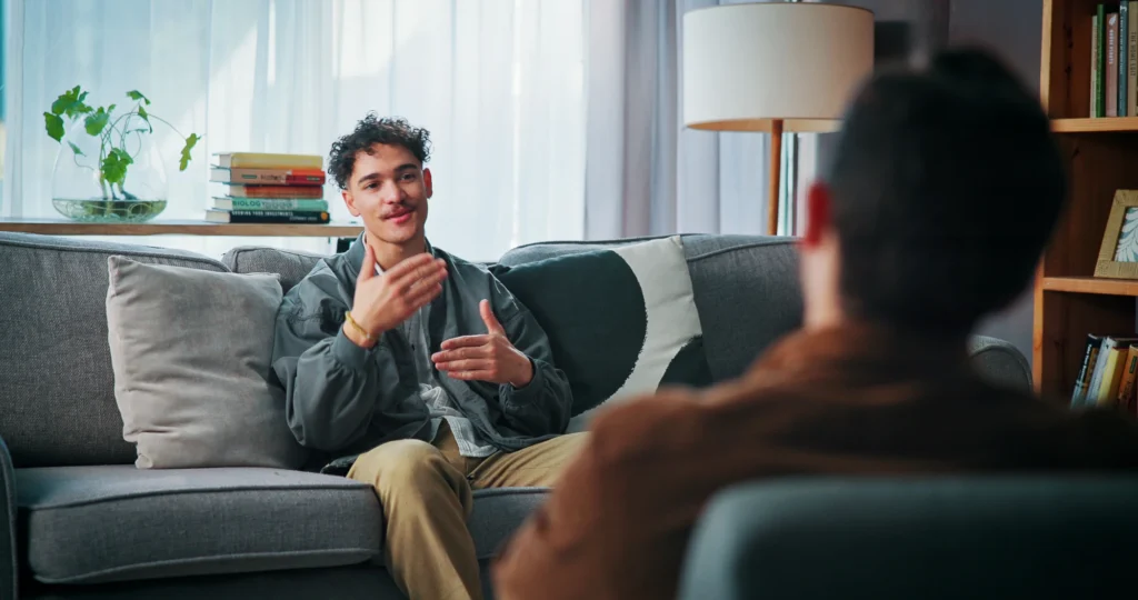 Newmont employee speaking with an addiction treatment professional.